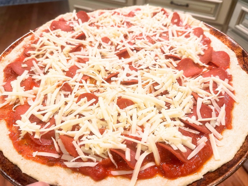 in process pizza on a pan
